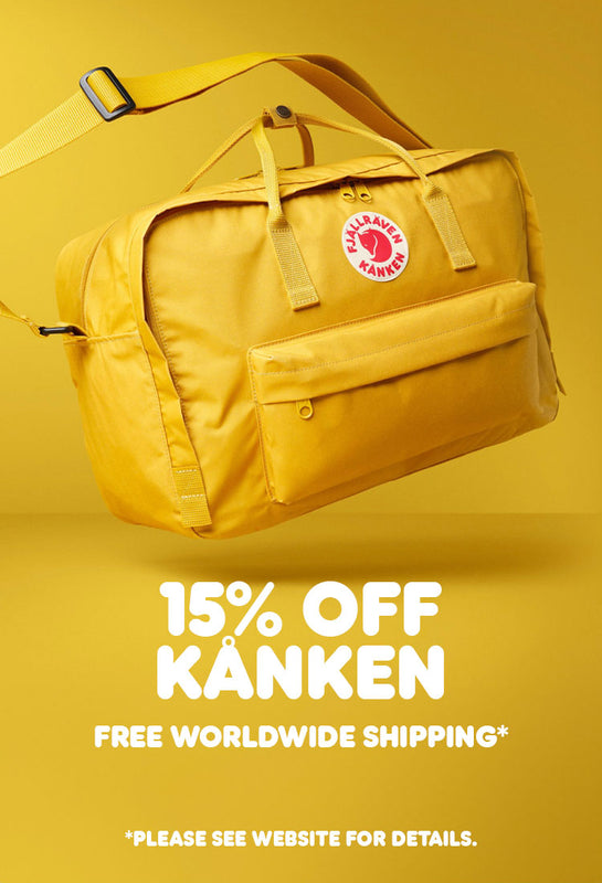 Mustard yellow Fjällräven Kånken bag on a yellow background with a 15% off sale and free worldwide shipping offer.